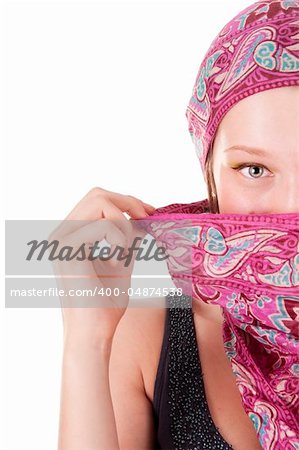 Young woman with covered face by scarf isolated on white