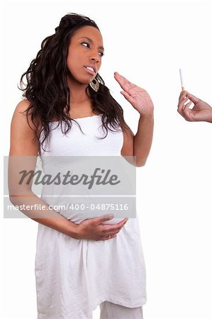 pregnant african american woman refusing a cigarette