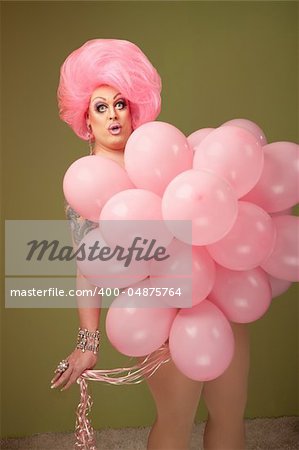 Large woman with pink balloons on green background