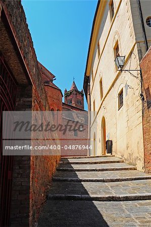 Narrow Alley With Old Buildings In Italian City of Siena