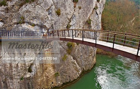 Mounted on the Rocks Wooden Bridge over the River Aragon