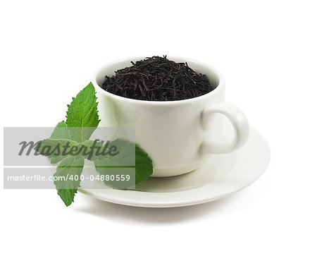 Cup of black tea with mint leaf on white background