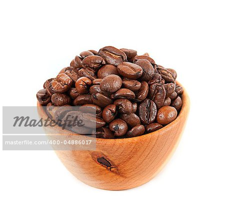 coffee beans in a wooden platter isolated on a white background