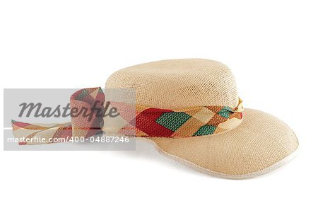Straw hat with textile lace isolated on white background.