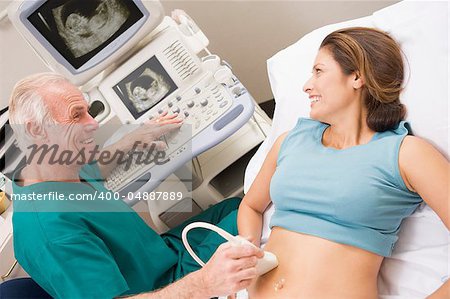 Doctor Giving Patient An Ultra Sound