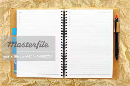 Open blank note book, on Grunge paper background