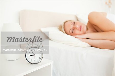 Quiet woman sleeping in her bedroom