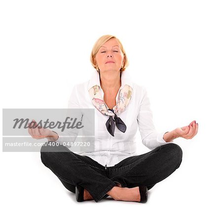 A picture of a mature woman practising yoga over white background