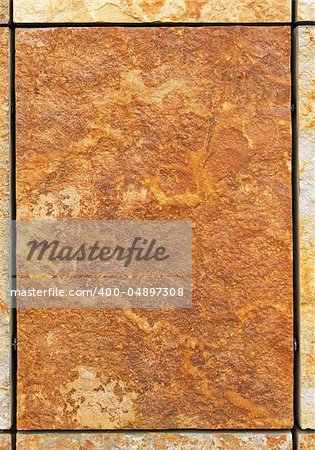 Brown marble tile with rough surface area