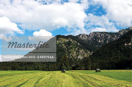 beautiful alpine landscape with sky and mountains
