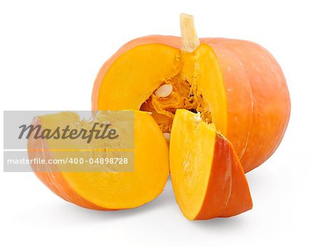 Fresh pumpkin and two slices isolated on white background