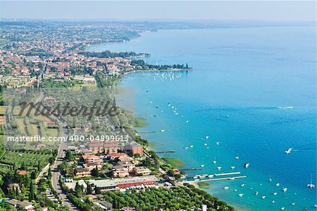 View to the south-east part of Garda lake from the high mountain in one beautiful day of summer