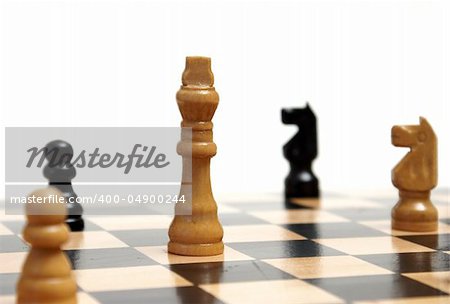 A closeup shot of a strategic game of chess.