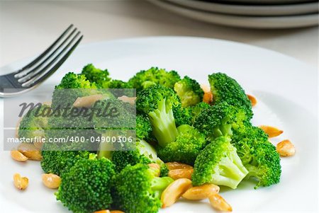 fresh and vivid sauteed broccoli and almonds very healthy food
