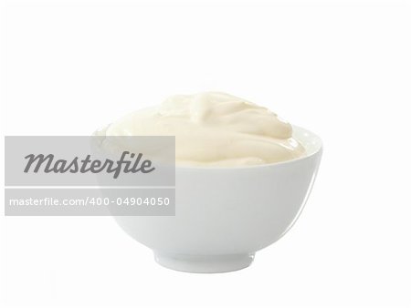 bowl of sour cream isolated on a white background