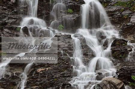 texture of flowing water on a stone mountain