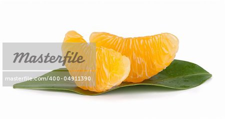 Mandarin citrus fruit slices isolated on white
