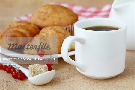 breakfast with fresh coffee, fresh croissants and fruits