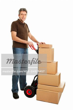 Delivery man with hand truck and stack of boxes. Isolated on white
