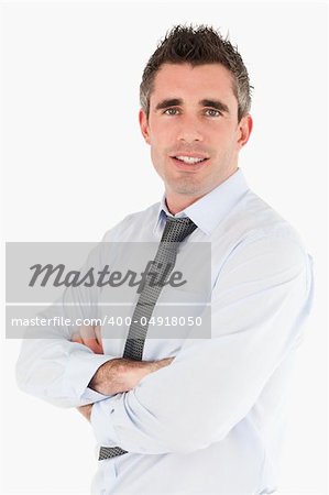 Portrait of a smiling salesperson posing against a white background