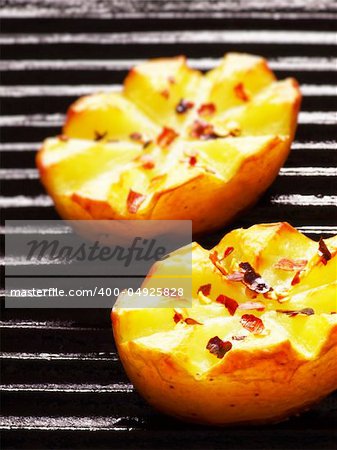 close up of baked potatoes