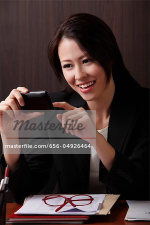 Young woman looking at phone