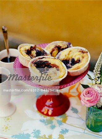 Cinnamon buns on cake stand