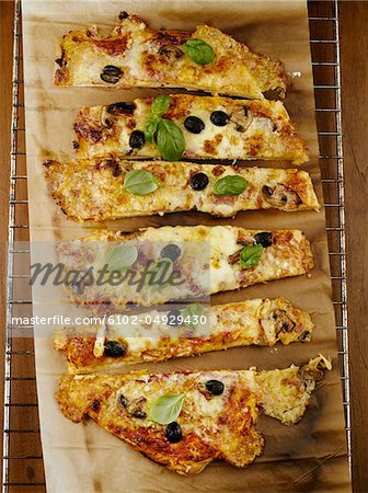 Pizza cut into pieces Pizza cut into pieces