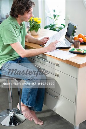 Mid adult man working from home