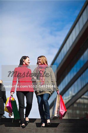 Pair of young women shopping