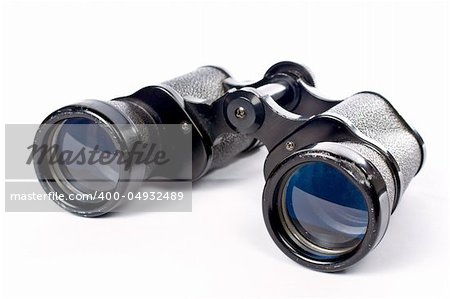 Used black binoculars with shadow on a white background