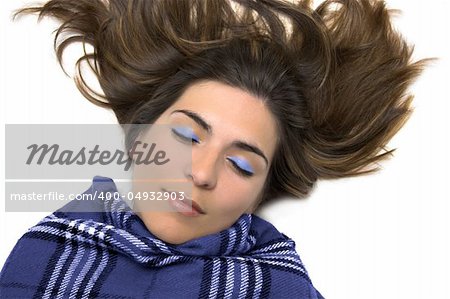 Young woman sleeping with a blue make-up