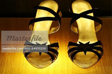 A pair of high heel shoes for women.