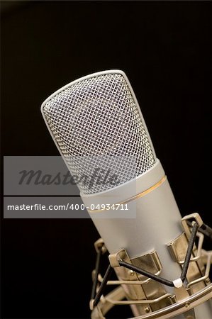 song microphone on black background