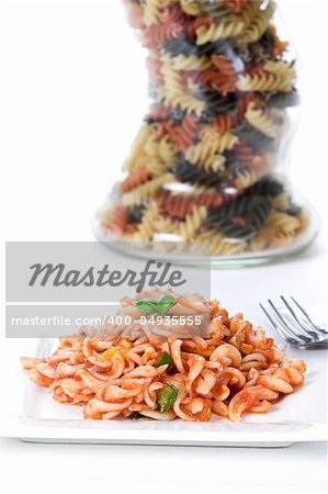 Screw noodle and tomato dish over white 2