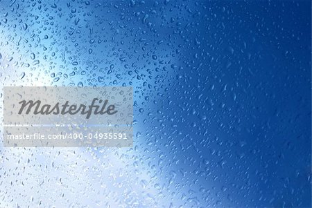 Nice bright blue droplets close-up background