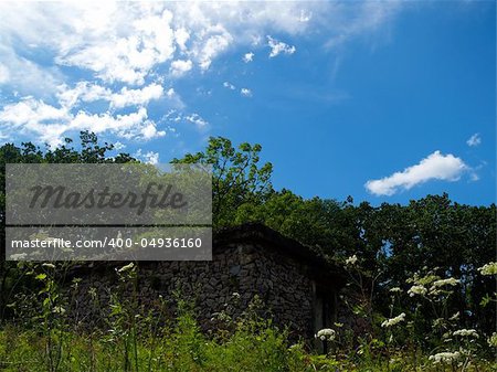 ruins against the blue sky and clouds