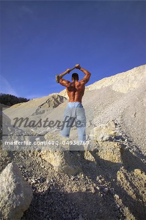 Man at work in stone-pit