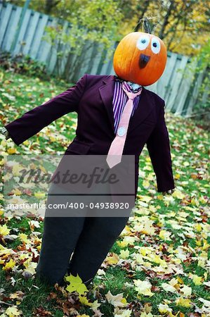 Pumpkin person in a suit. Celebrating the start of the harvest season and Halloween in Canada.