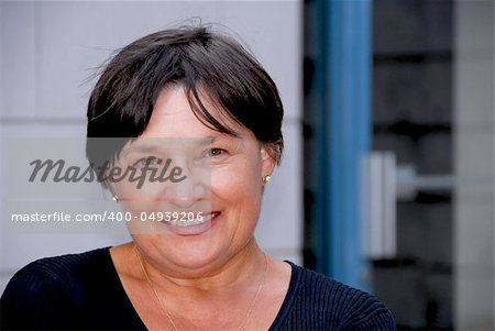 Mature woman portrait in the city