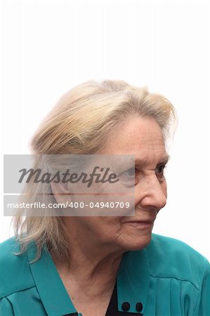 Three-quarter portrait of elderly woman in blue blouse, isolated on white background