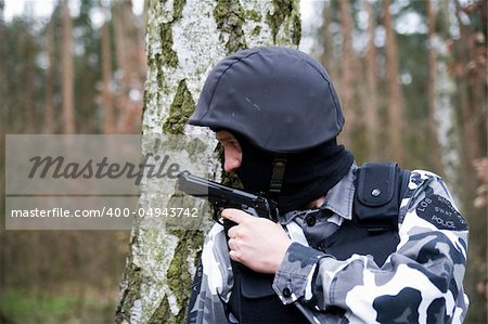a lonely S.W.A.T ranger in the forest