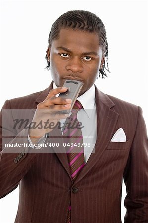 This is an image of a businessman pondering/focussing while holding a personal digital assistant/mobile phone. This image can be used to represent planning themes.
