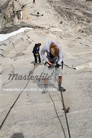 Females climbing Half Dome before the cables are up.
