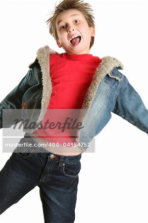 Child wearing plain red shirt, denim jacket and jeans mid jump.   Some parts in slight motion.