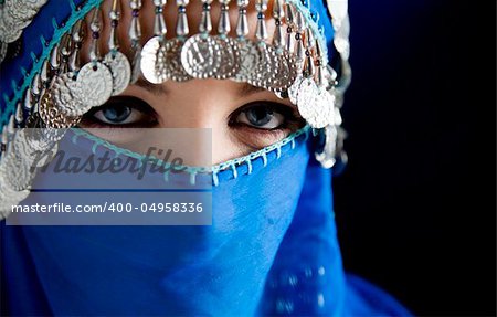 middle eastern culture: belly dancer with traditional veil