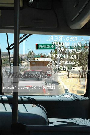 View through the windshield of a bus in Cabo San Lucas, Mexico