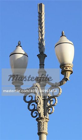 Retro street lamp under the clear blue sky