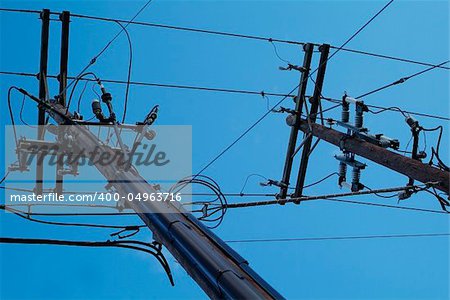 power lines with blue sky perspective