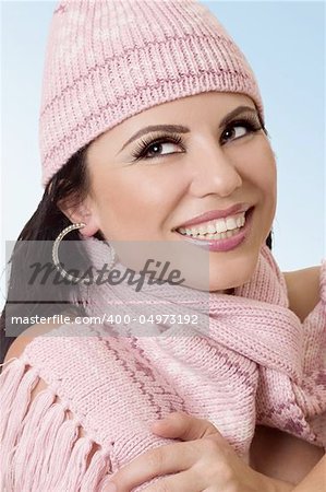 Attractive woman in cozy knits with a warm happy smile